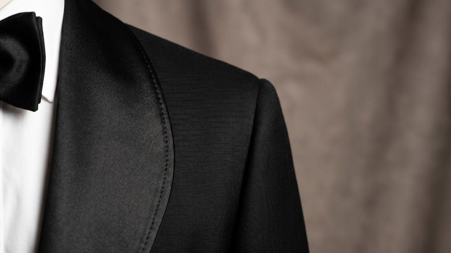 Black shawl lapel tuxedo jacket with satin lapel and precise stitching for formal occasions buying from 199.90