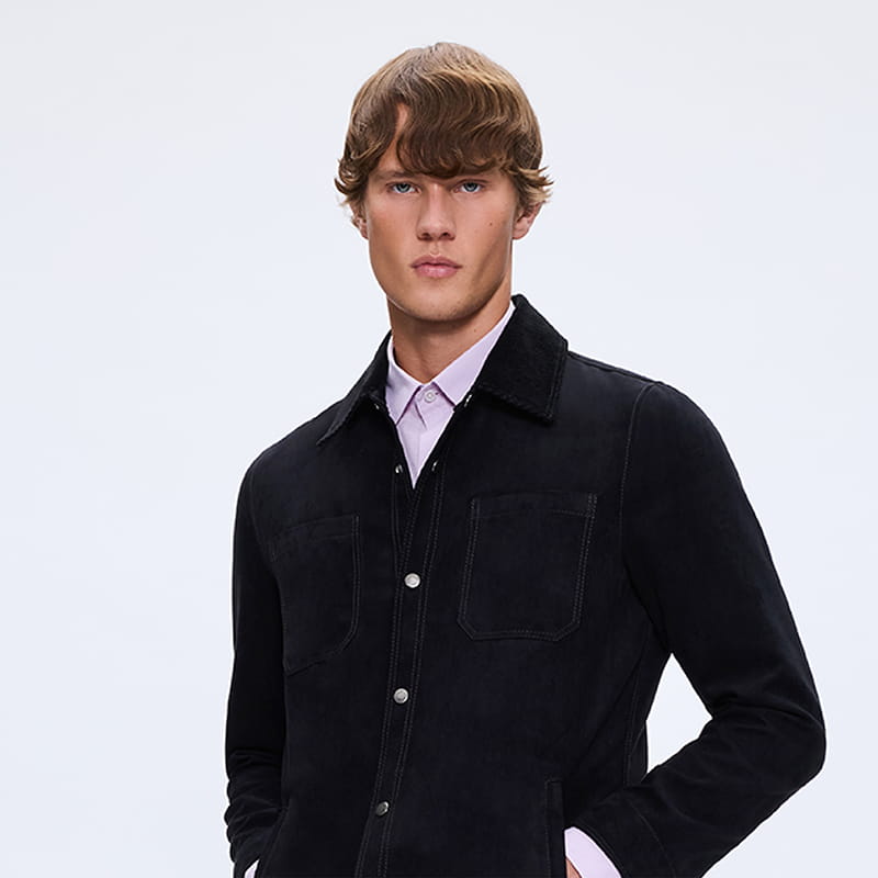 Man in black casual jacket with shirt, minimalist menswear gift selection