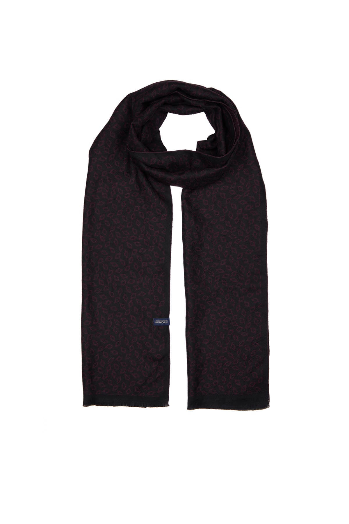 Black cashmere scarf with subtle textured pattern and a small brand tag at the bottom edge.