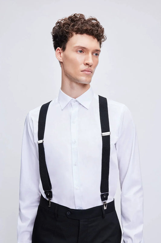Black leather trim clip suspenders with black straps and silver-toned metal clasps and adjustable buckles