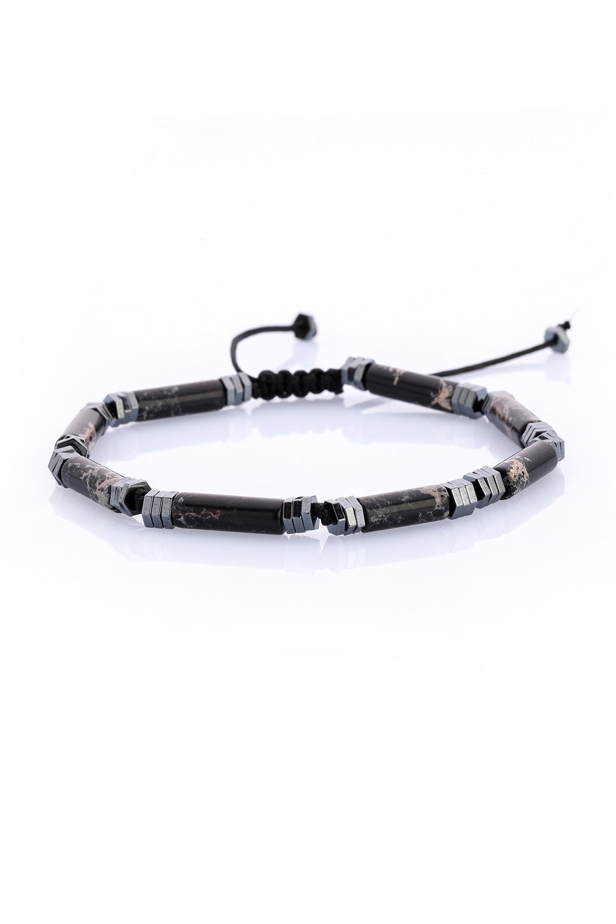 Black and silver beaded bracelet with a braided cord closure.