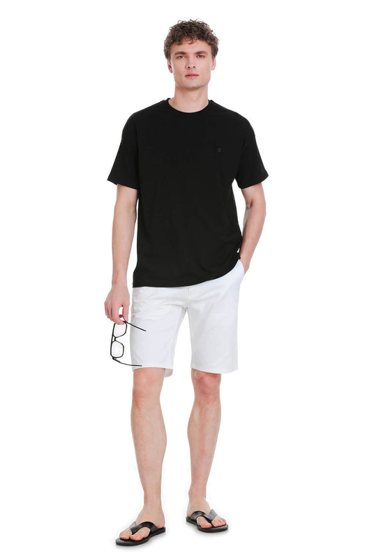 Black oversize crew neck t-shirt featuring short sleeves and a small embroidered logo on the left chest