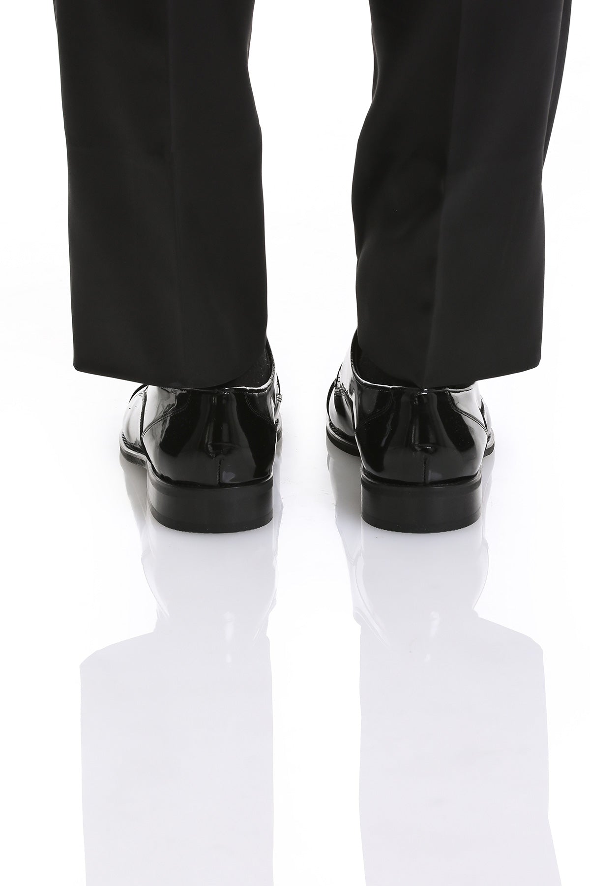 Black patent leather dress shoes with a sleek, polished finish and classic oxford design.