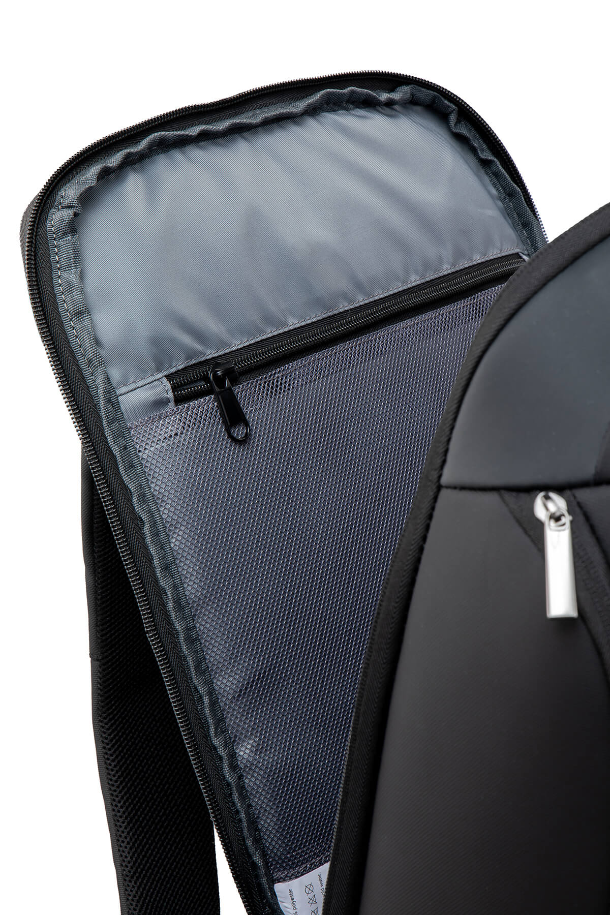 Black nylon backpack with mesh interior and silver zipper pulls.