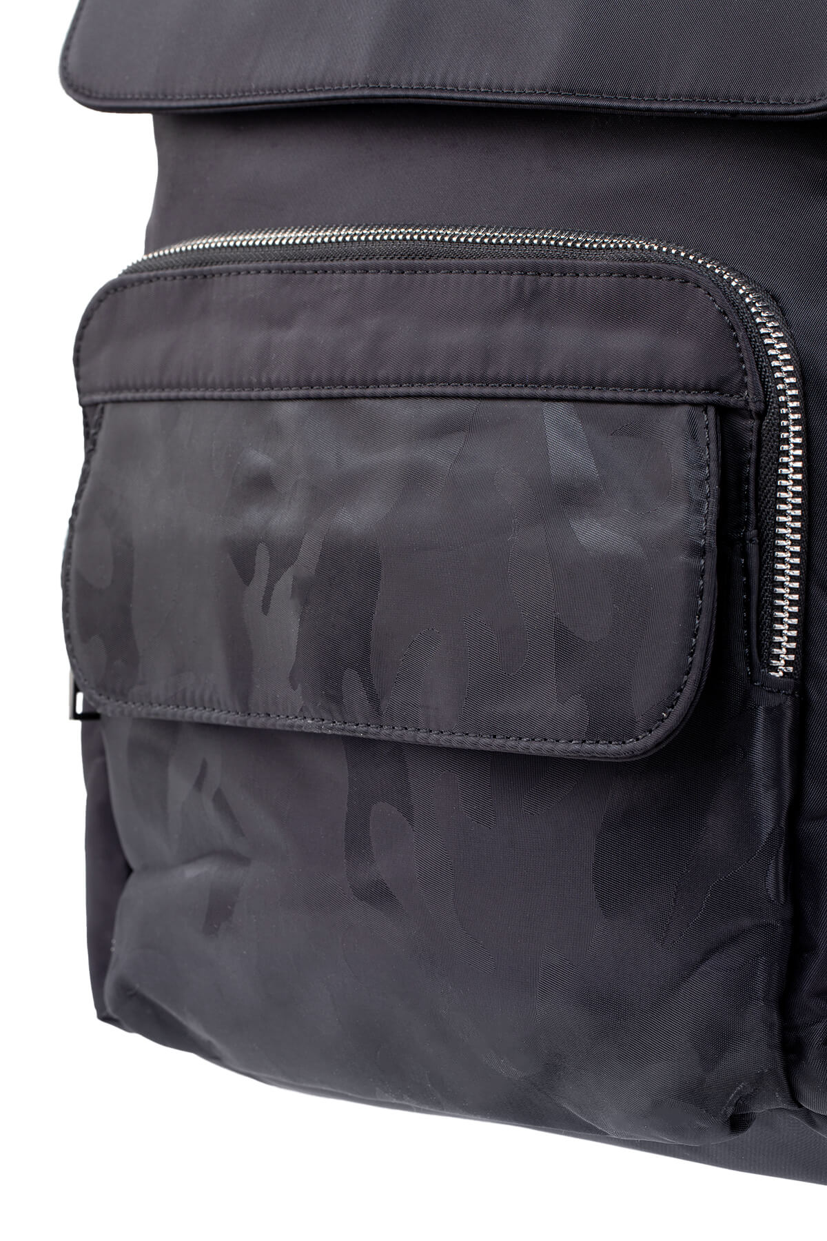 Black camouflage-patterned backpack with a zippered front pocket and silver zipper.