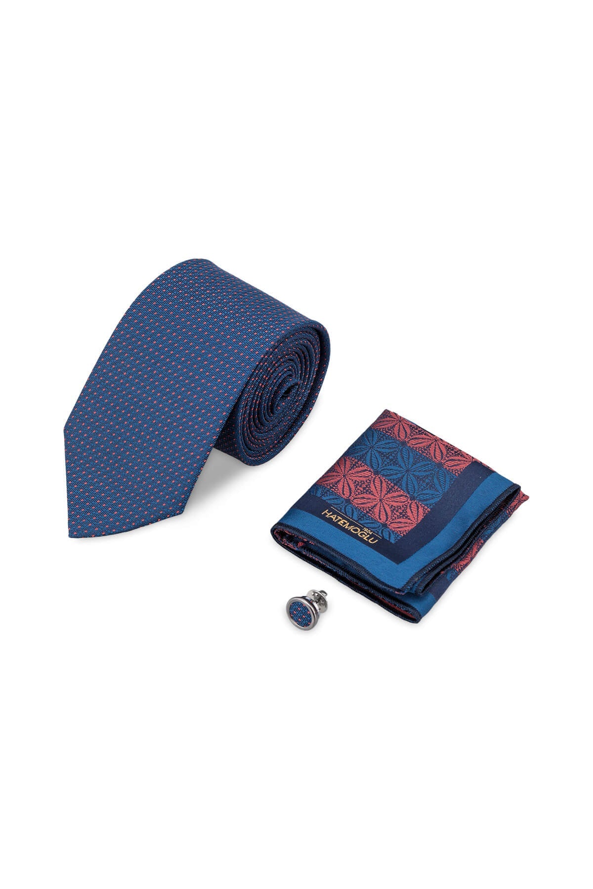 Navy blue patterned tie with subtle dots paired with coordinating pocket square and lapel pin in 3-piece set