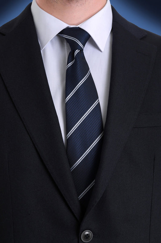 Dark navy tie with crisp white diagonal stripes, crafted from a textured fabric.