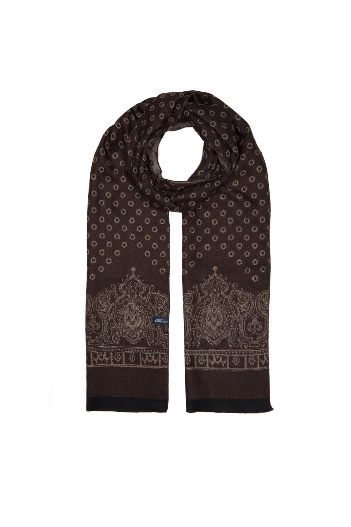 A dark brown scarf with a subtle pattern of small, light-colored geometric shapes and ornate paisley designs along the bottom edges.