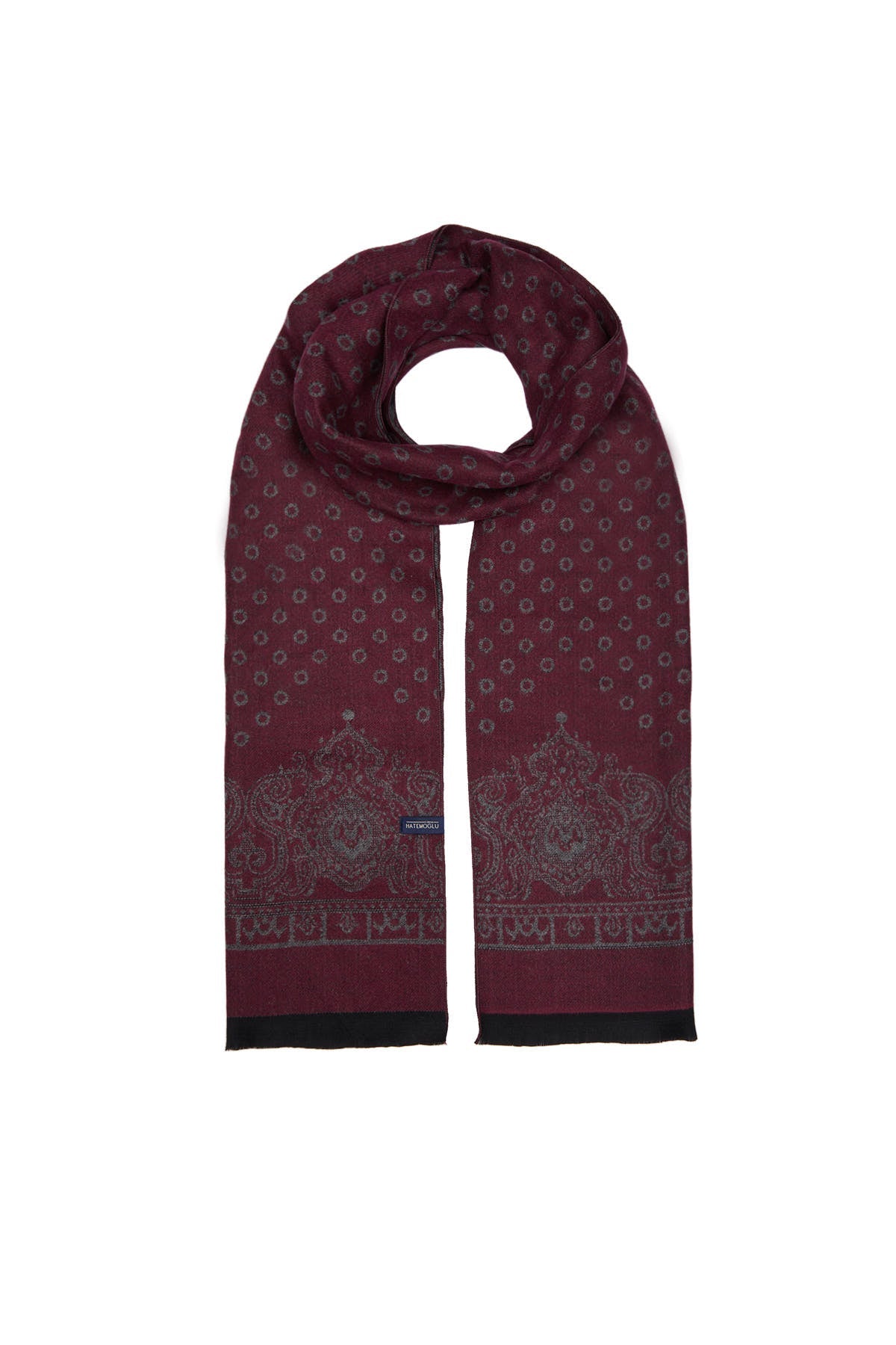 A maroon silk scarf with a subtle pattern of small geometric shapes and intricate paisley motifs near the ends, accented by black trim.