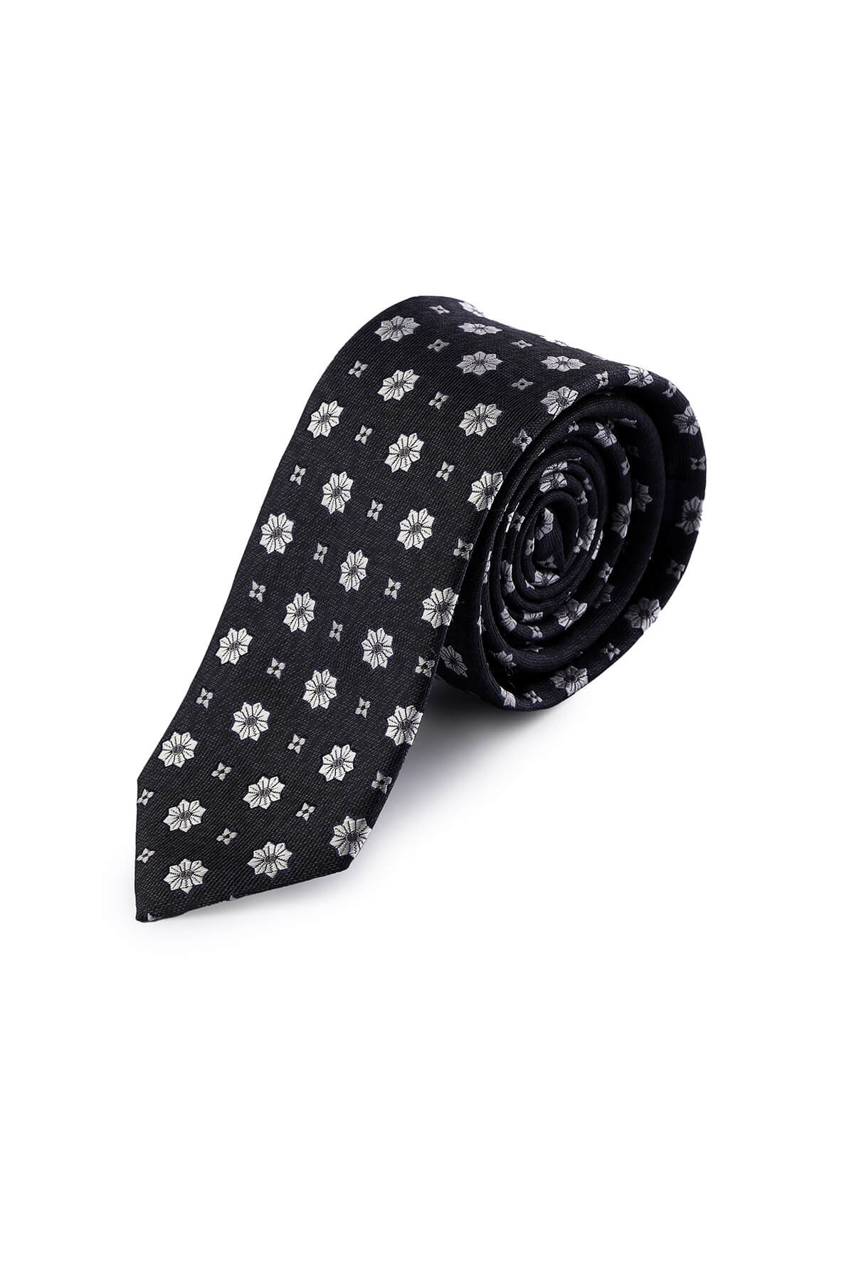 Black silk tie with a subtle pattern of white floral and geometric motifs.