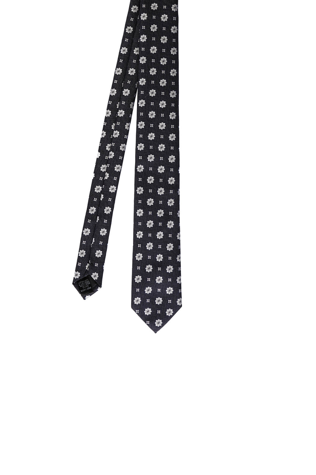Black silk tie with a repeating pattern of small white floral motifs.
