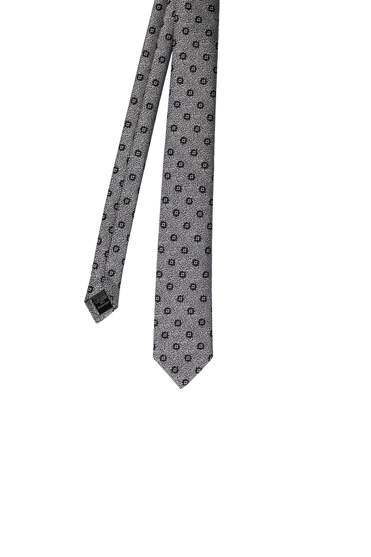A sleek gray tie with a subtle black geometric pattern, crafted from fine woven fabric.