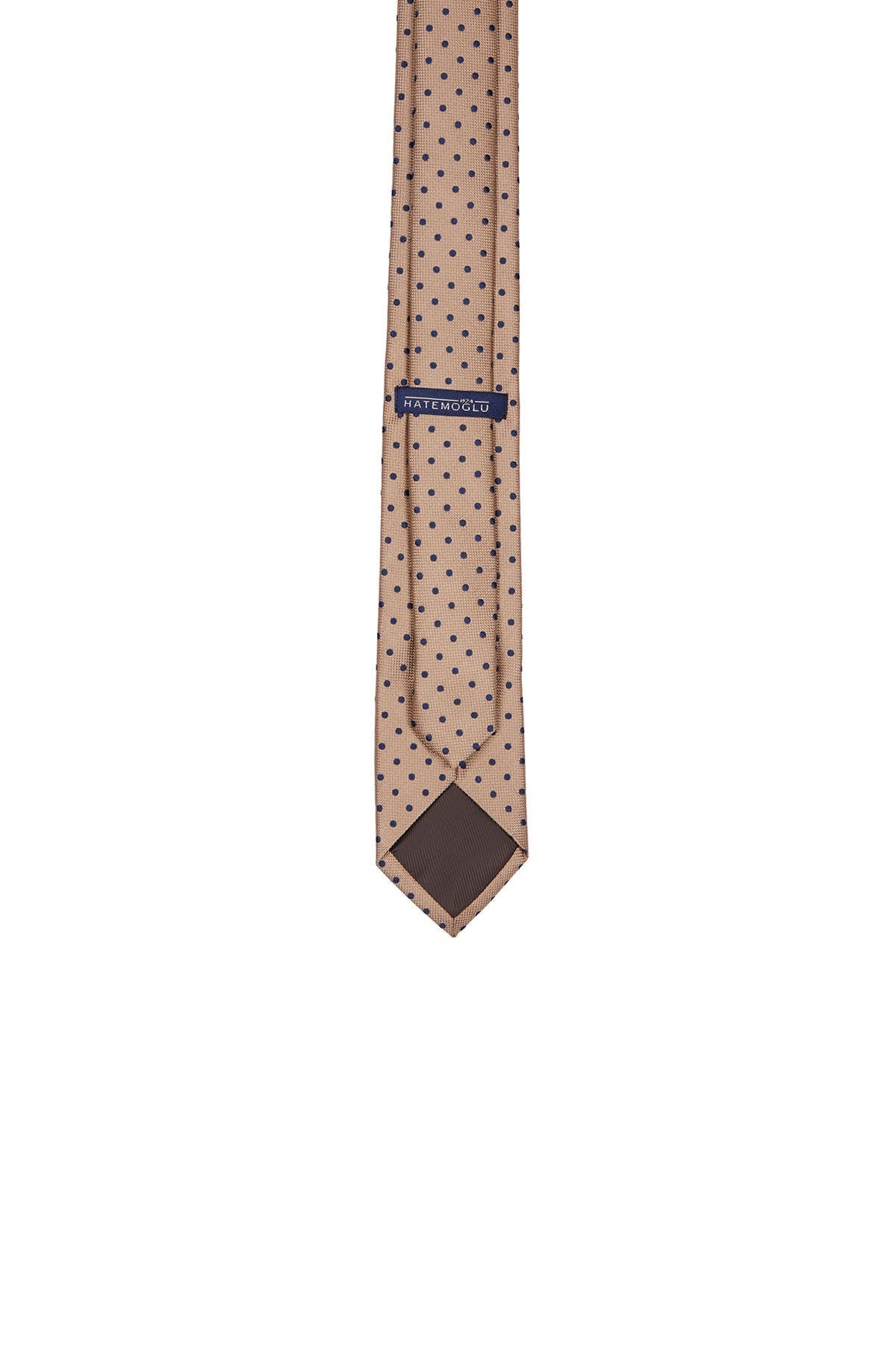 A beige tie with small dark brown polka dots and a matching brown triangular tip, featuring the ’natenollo’ brand label.