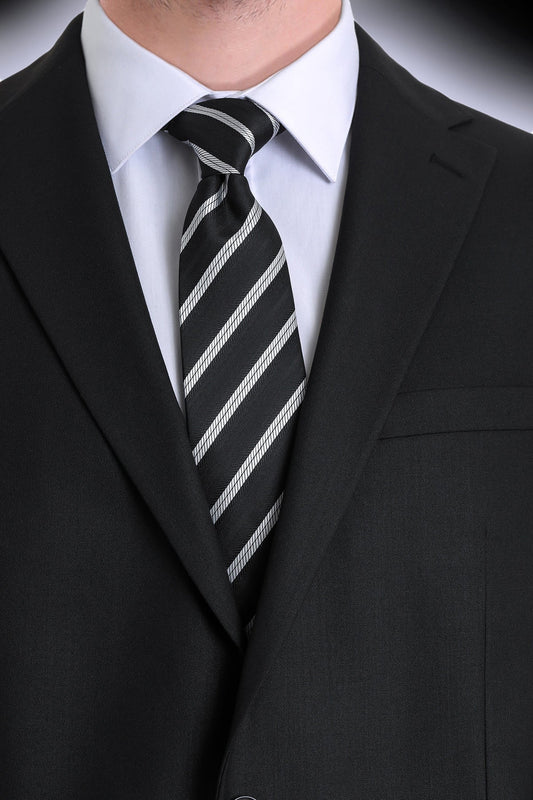 Black tie with diagonal white stripes, made of smooth silk-like material.