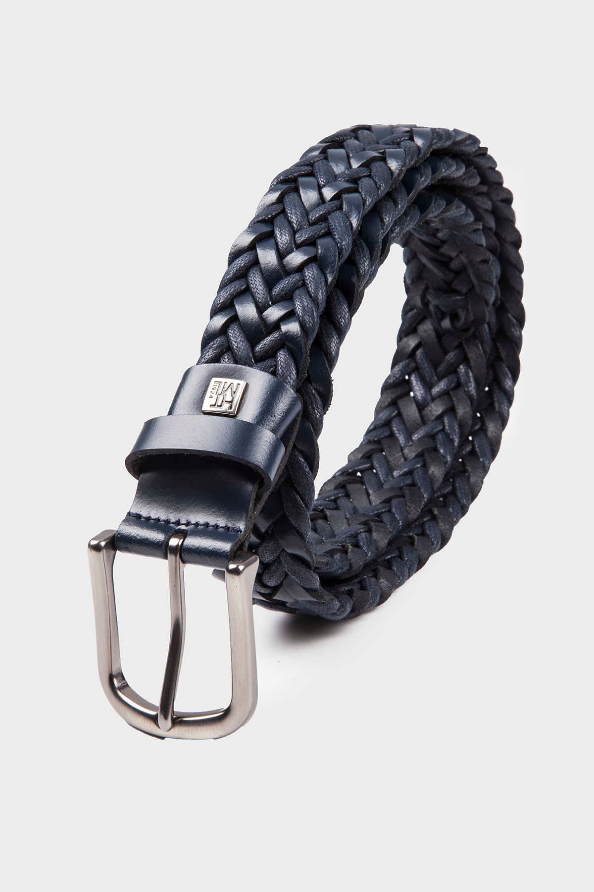 Dark blue braided leather belt with a silver-toned buckle and a small rectangular brand plaque.
