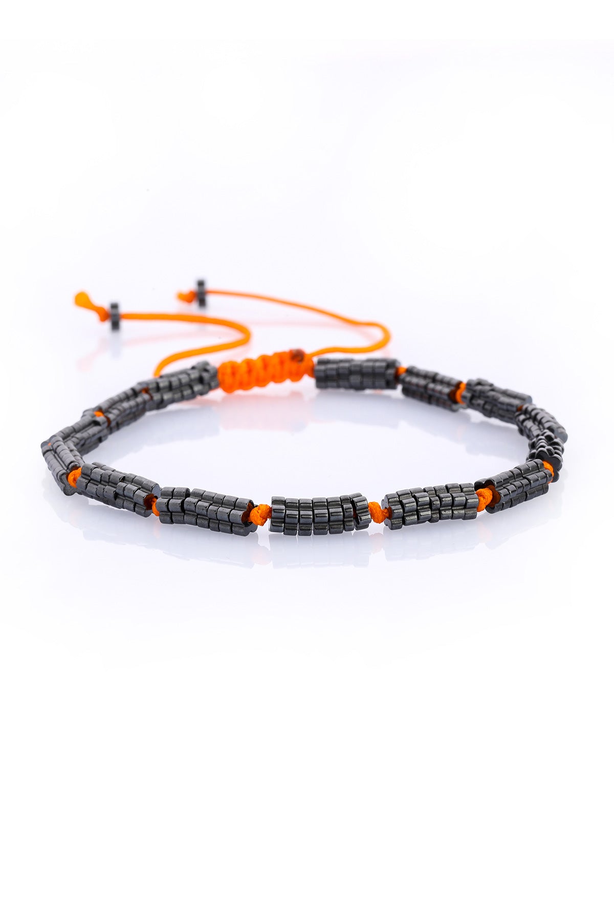 Black ceramic bead bracelet with orange cord and adjustable sliding knots.
