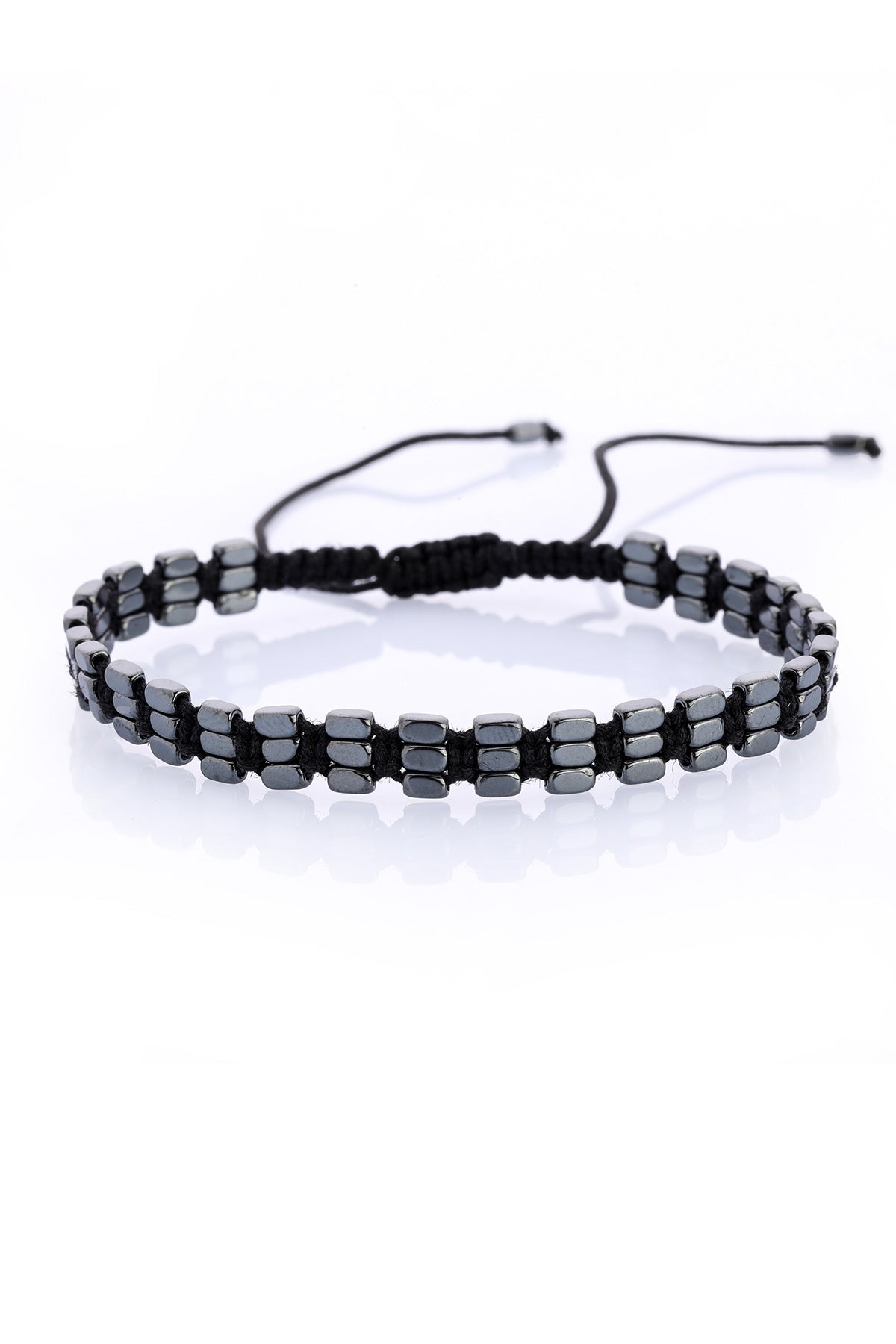 Black magnetic bead bracelet with a braided cord and adjustable ties.
