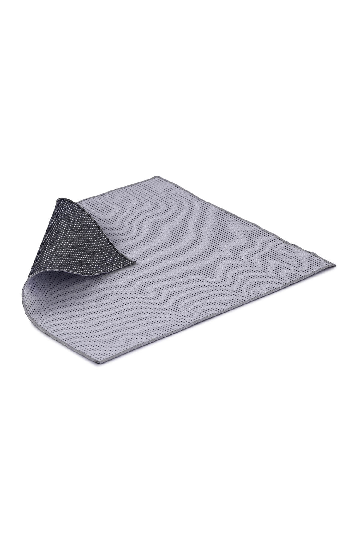 Gray textured non-slip mat with a perforated surface and dark backing.