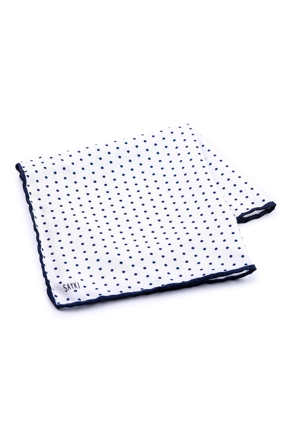White pocket square with navy blue polka dots and a matching navy blue scalloped edge.