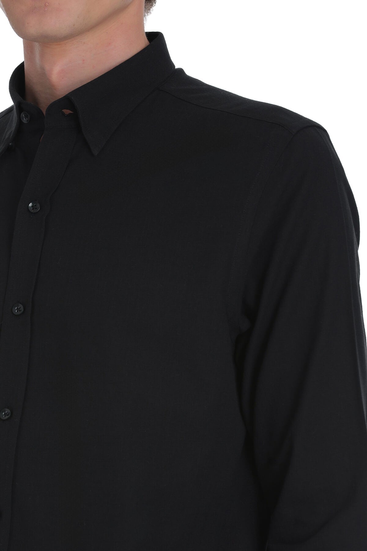 Black long-sleeved button-down shirt with a crisp collar and subtle texture.