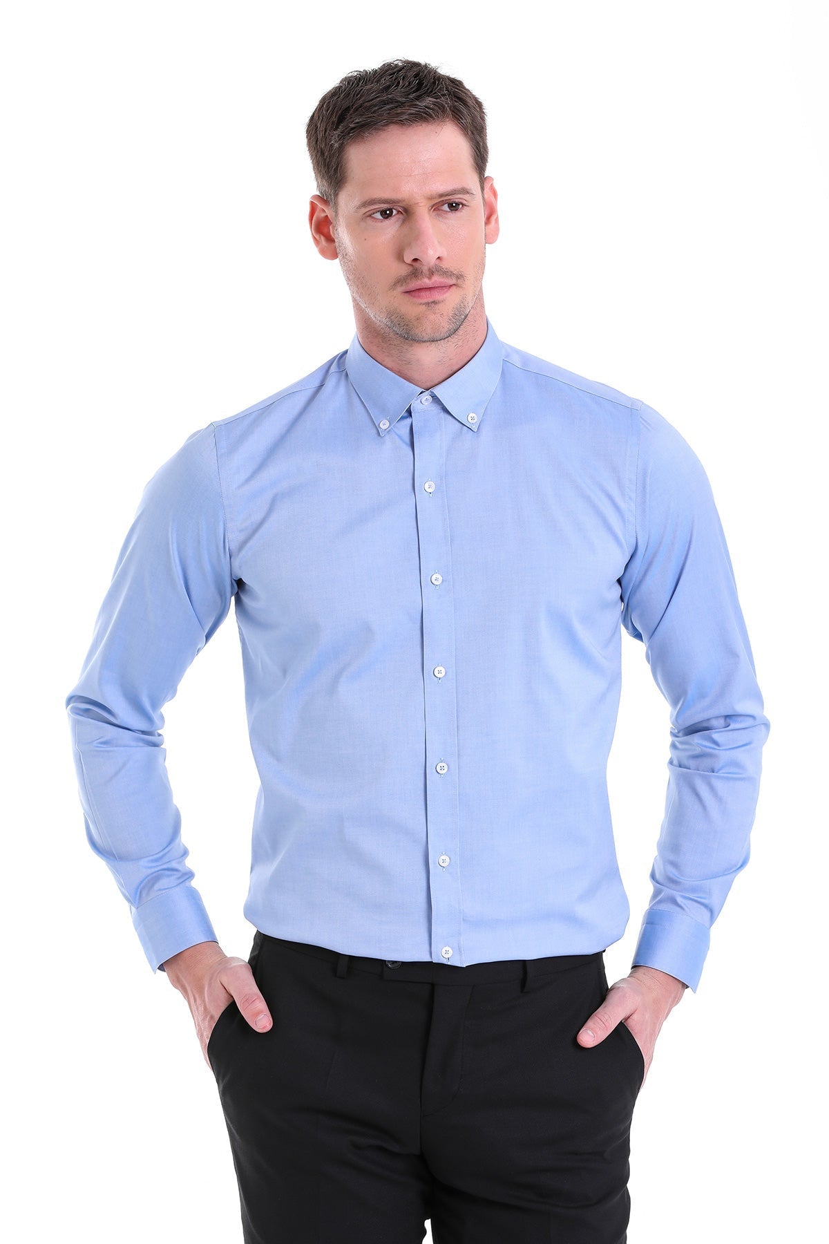 Light blue, long-sleeved men’s dress shirt with a button-down collar and white buttons.