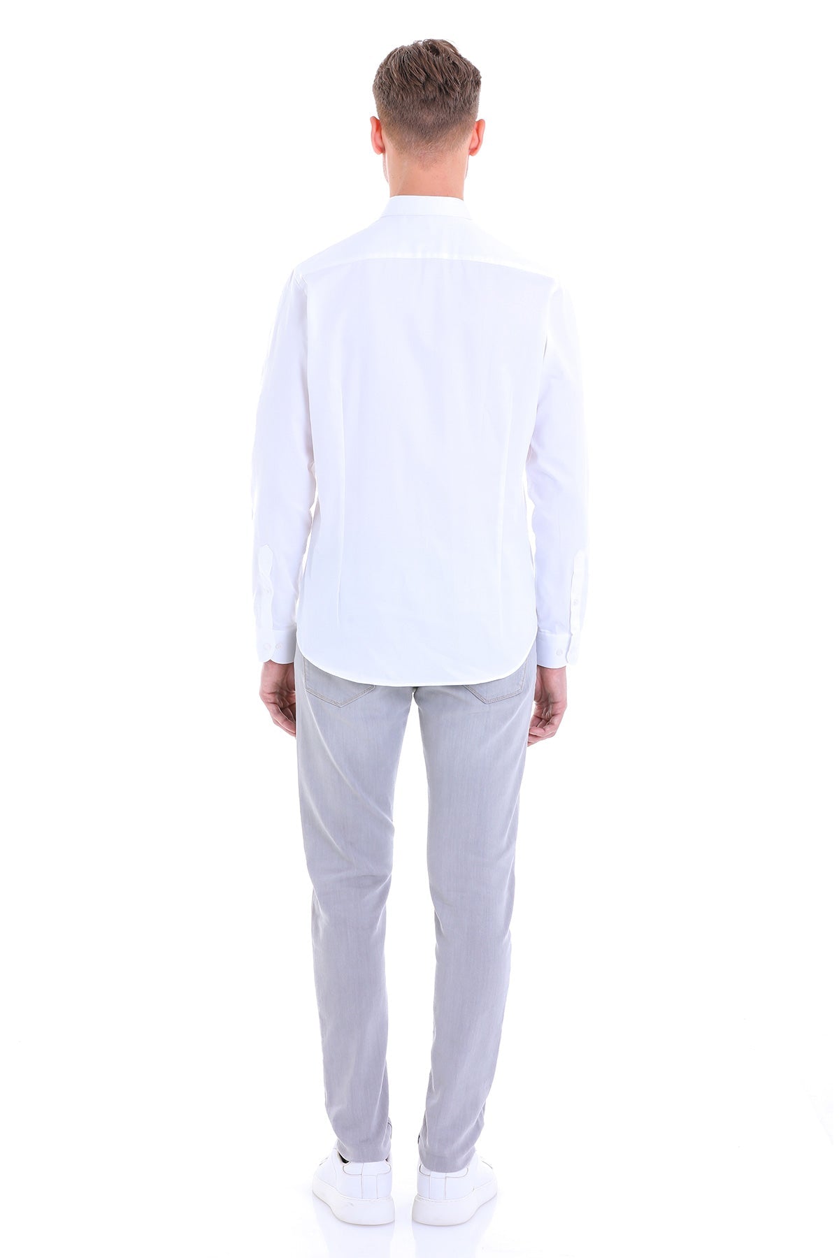 A crisp white long-sleeved dress shirt with a classic collar and tailored fit.