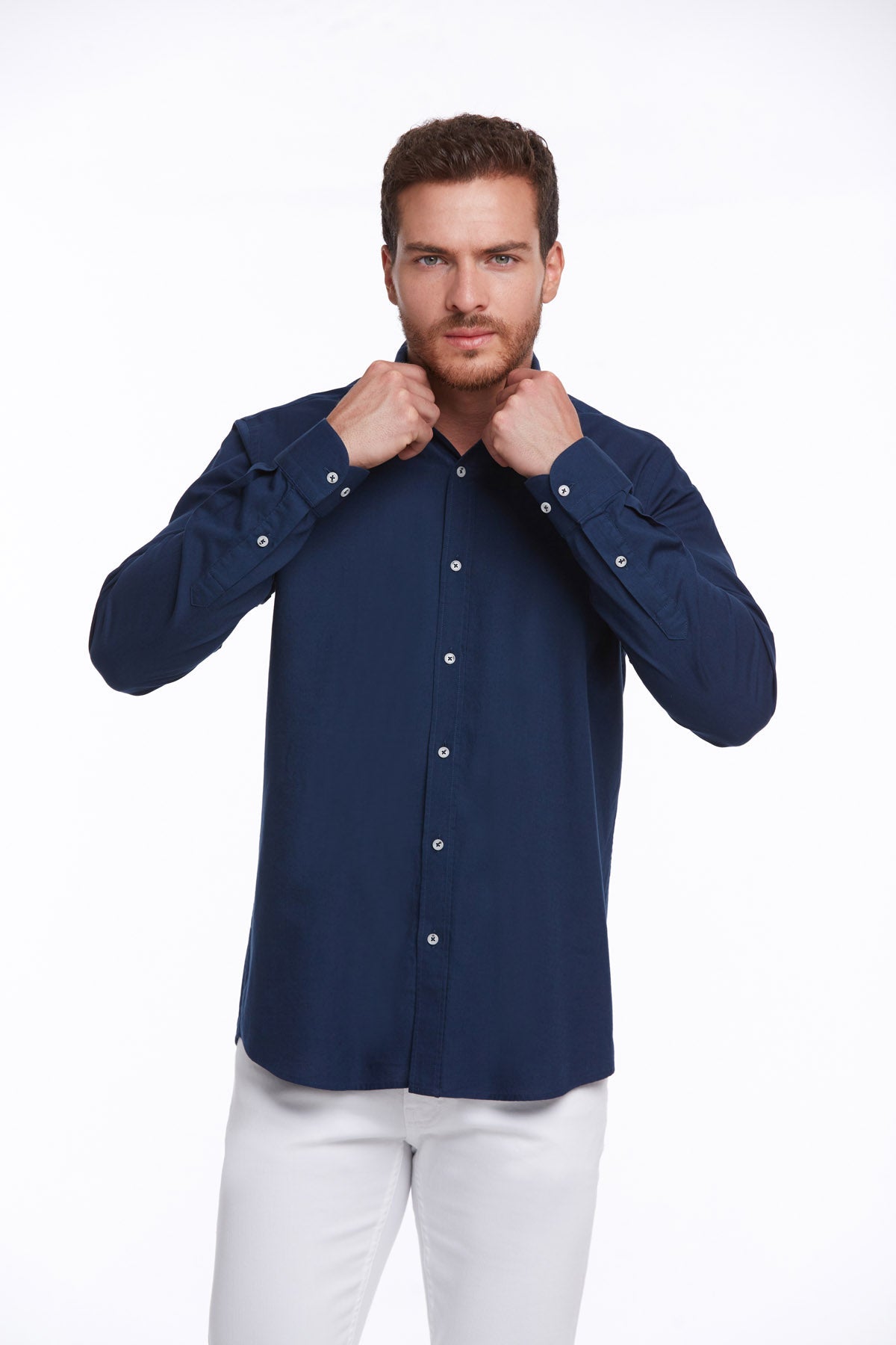 Navy blue long-sleeved button-down shirt with white buttons