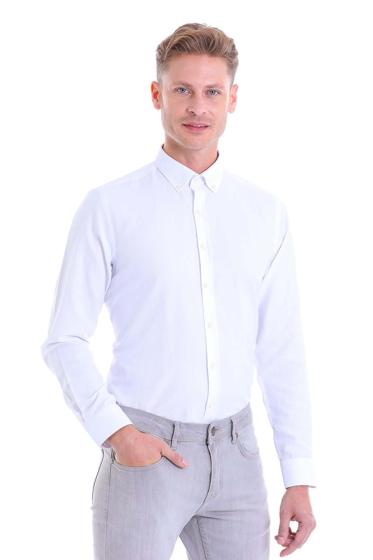 White long-sleeved button-down shirt with a classic collar and neatly pressed fabric.