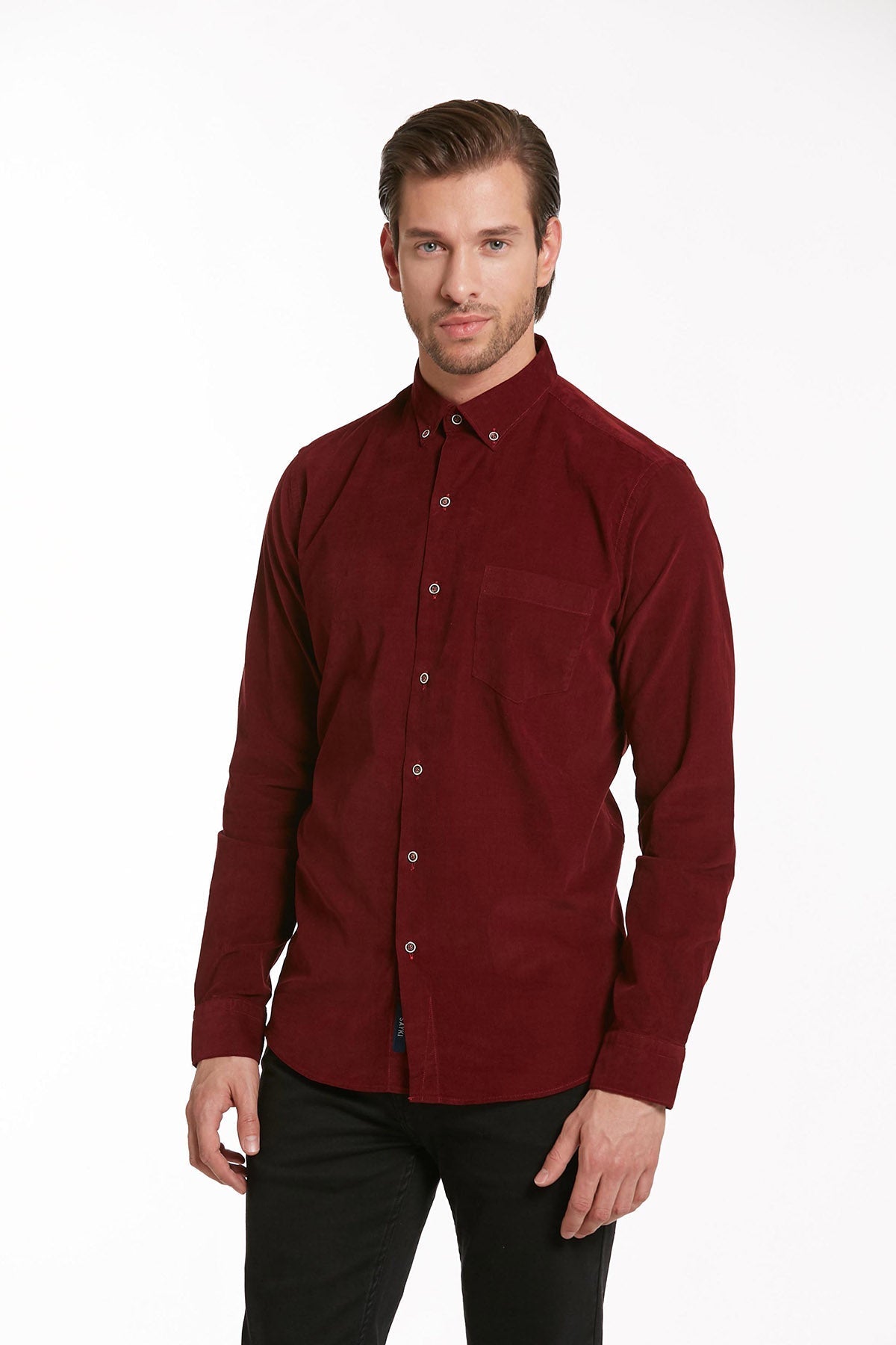 A rich burgundy corduroy button-down shirt with a classic collar and subtle vertical ridges.