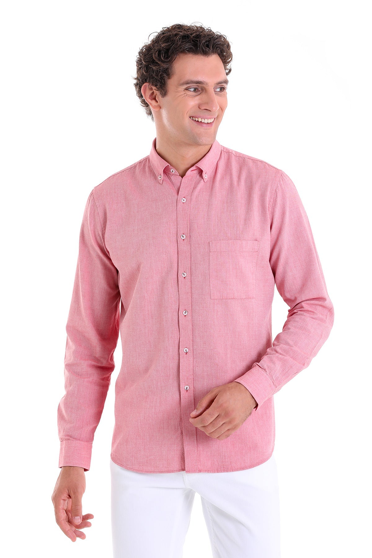 A soft pink, long-sleeved button-down shirt with a subtle textured weave and a single chest pocket.