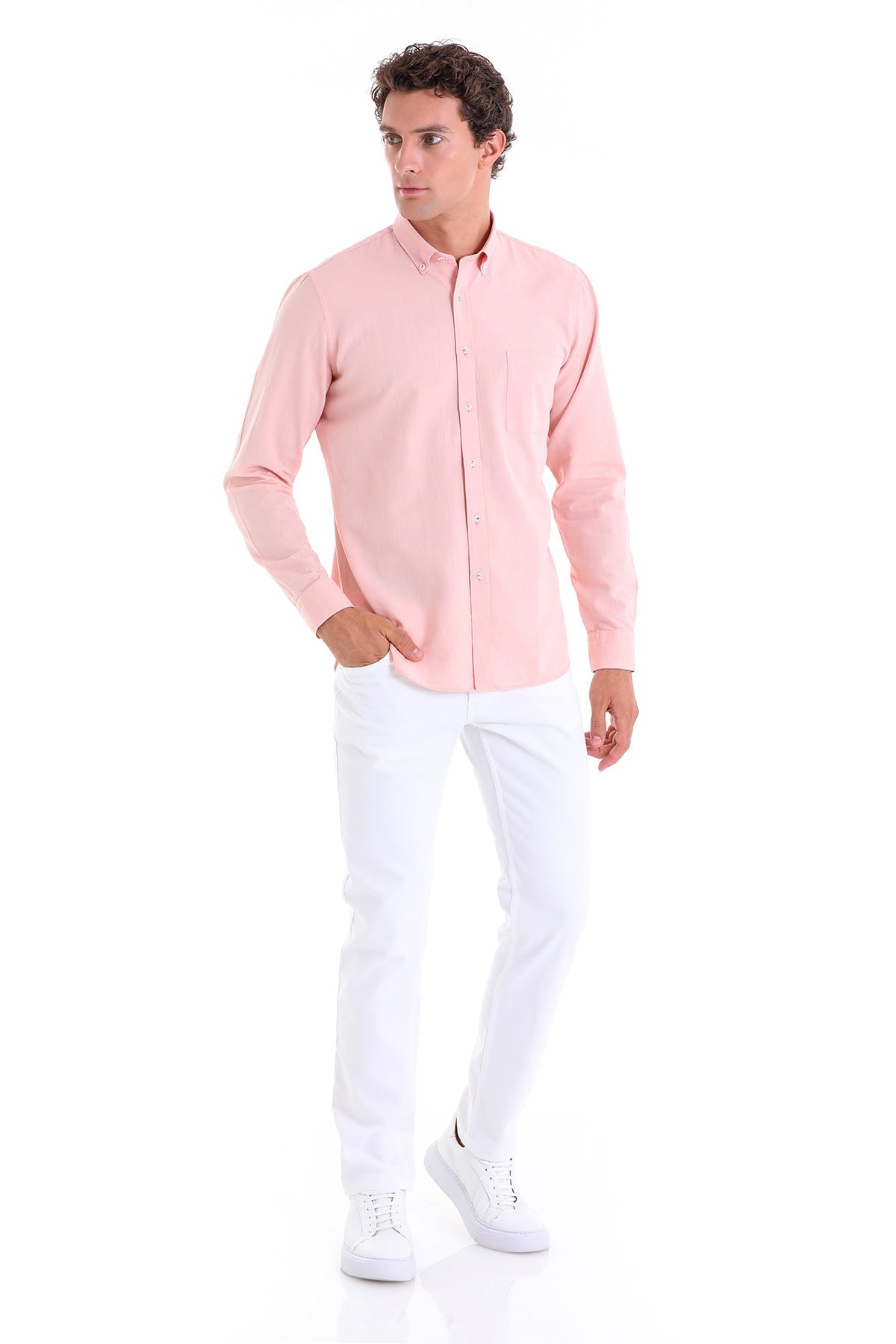 A soft pink long-sleeved button-down shirt with a classic collar and subtle stitching details.