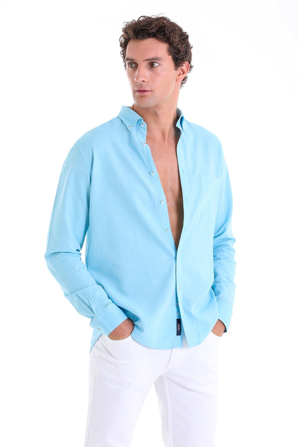 Light blue long-sleeved button-down shirt with a classic collar and neatly pressed fabric.