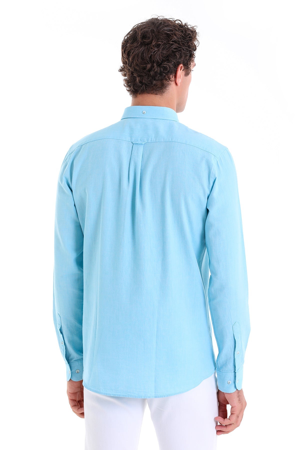 Light blue long-sleeved dress shirt with a classic collar and buttoned cuffs.