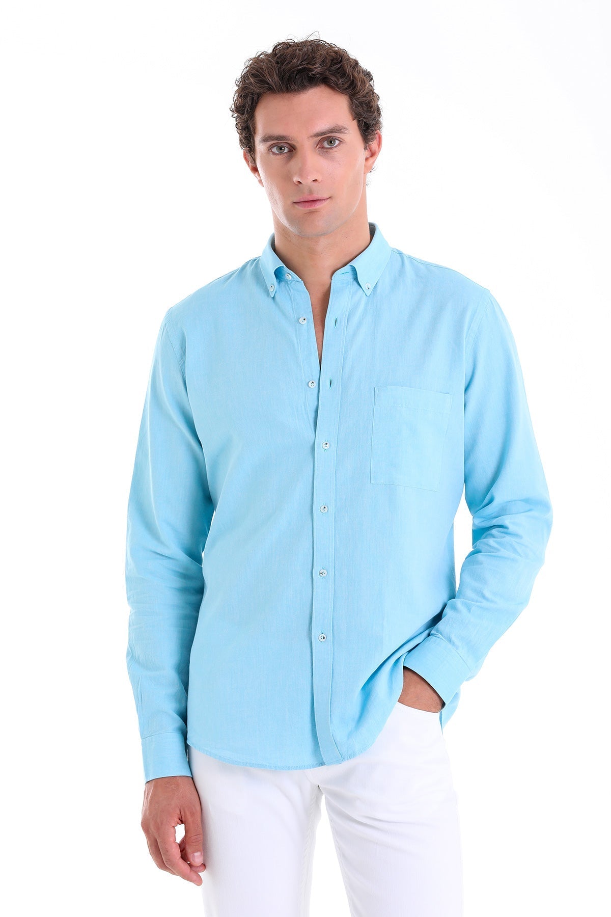 Light blue long-sleeved button-down shirt with a chest pocket.