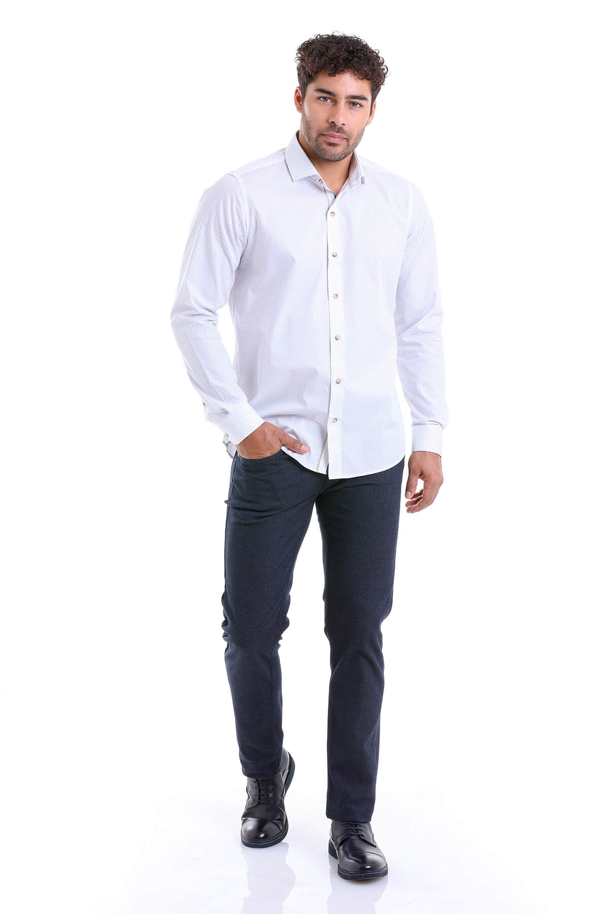 A crisp white long-sleeved button-down shirt with a classic collar and subtle texture.