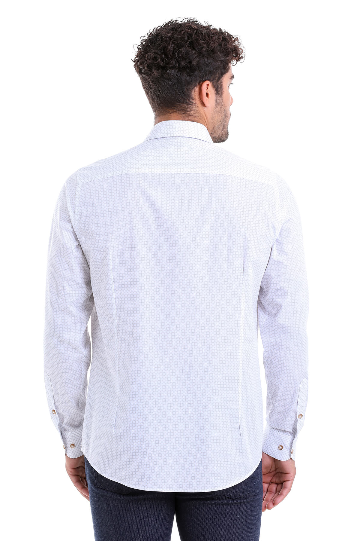White textured dress shirt with subtle pattern and buttoned cuffs.