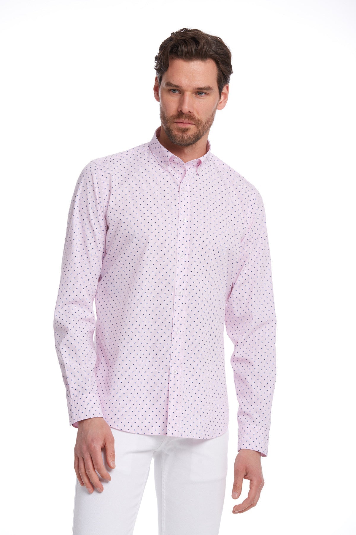 A light pink button-down shirt with a subtle pattern of small dark dots across the fabric.
