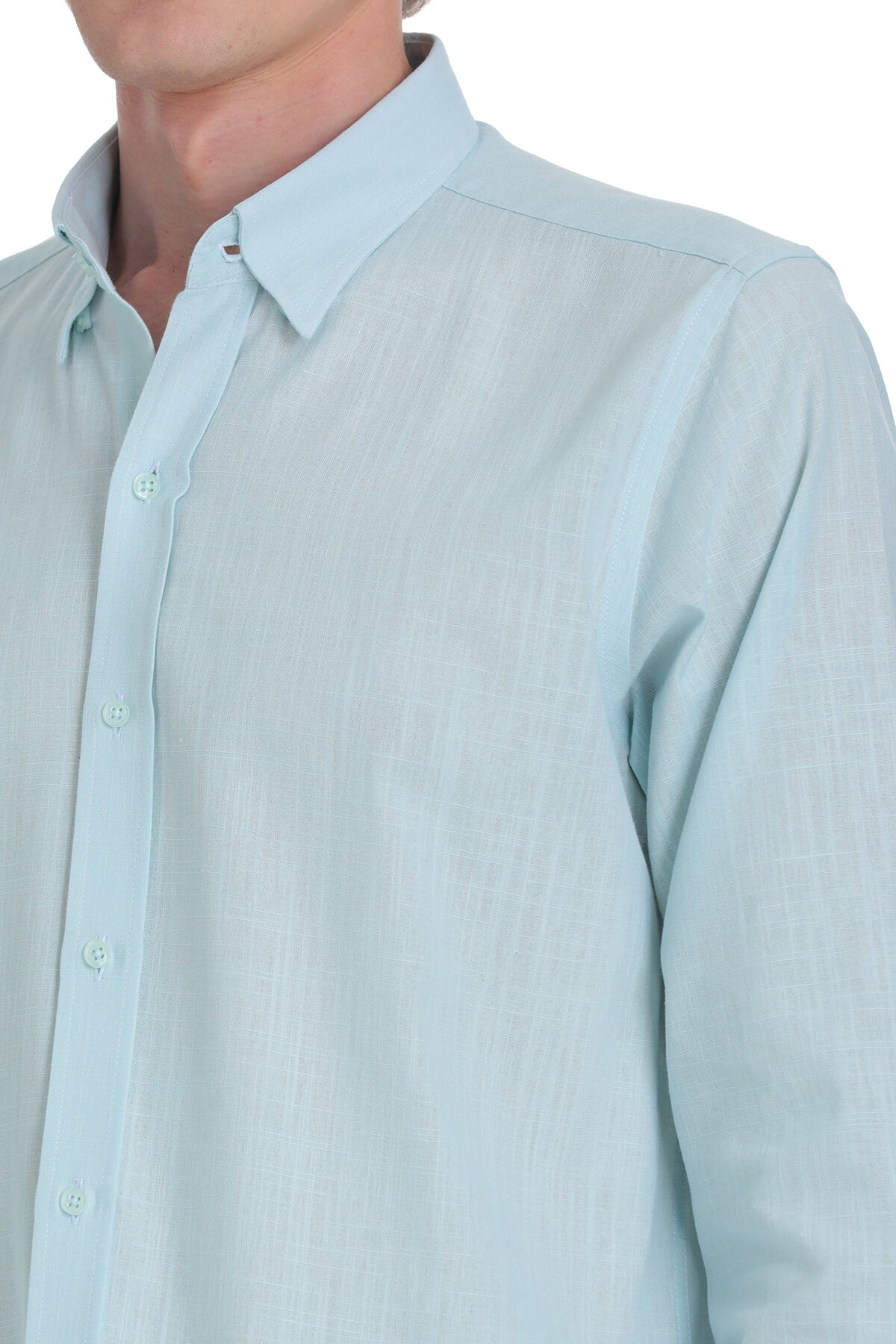 Light blue cotton button-down shirt with a classic collar and matching buttons.