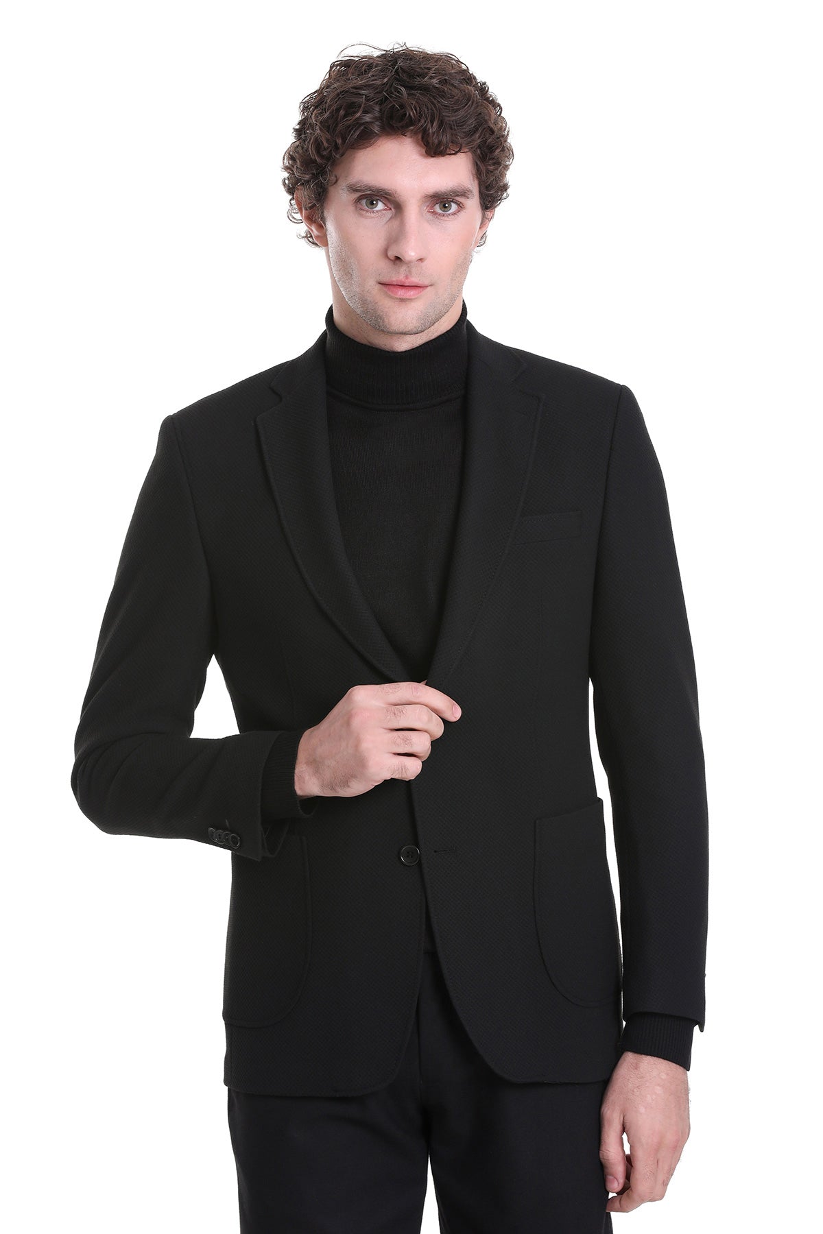 Black tailored blazer with notched lapels and a single button closure.