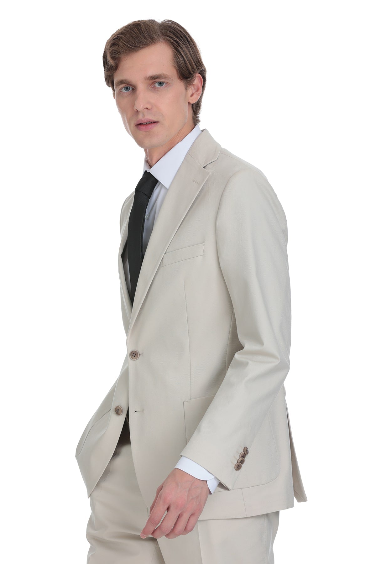 Beige two-button suit jacket with matching trousers, featuring a tailored fit and subtle texture.