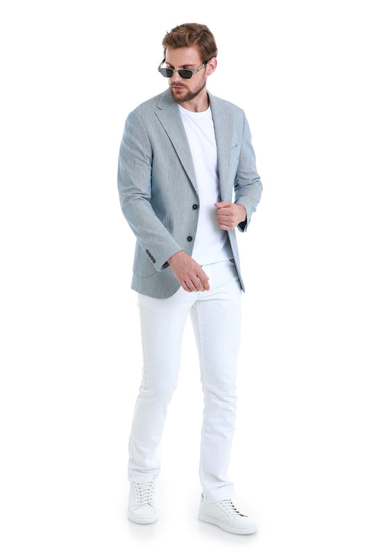 Light blue pinstripe blazer with black buttons.