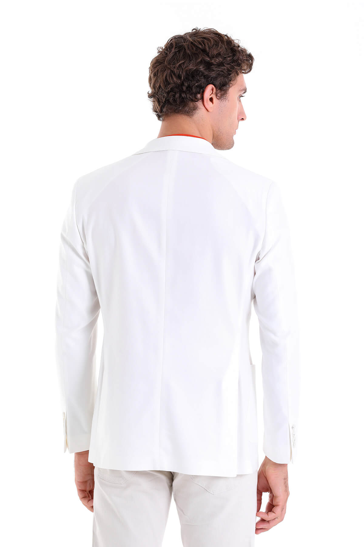 White tailored blazer with a clean, structured fit and subtle red trim along the collar.