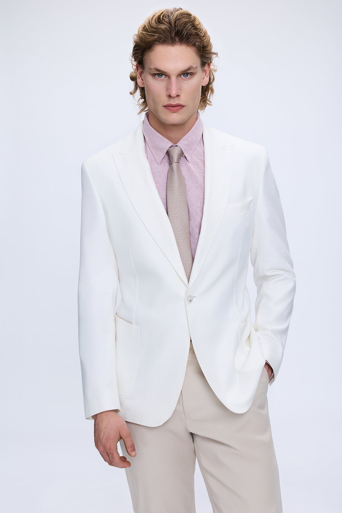 White tailored linen blazer with single button closure and comfort fit notch lapel for casual wear