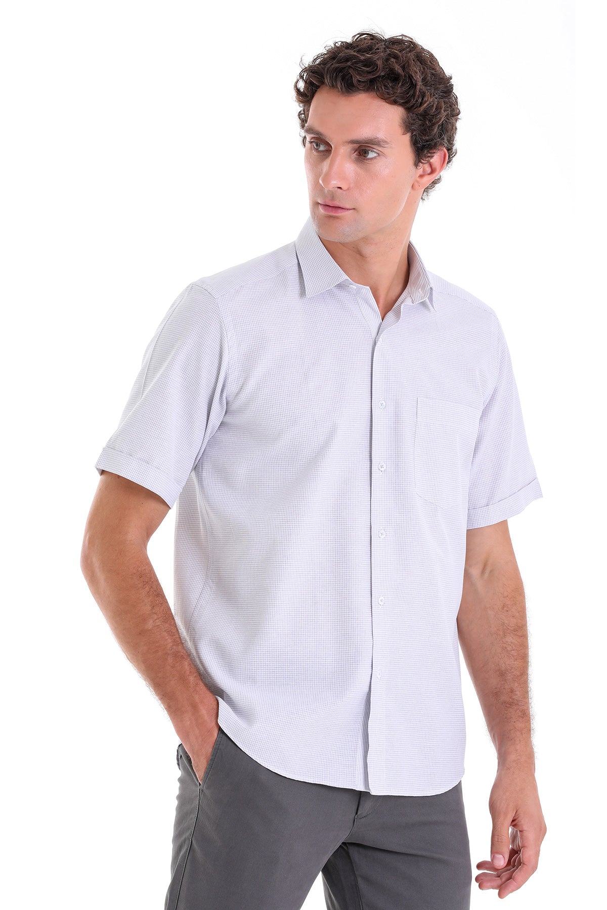 Light blue short-sleeved button-up shirt with a subtle grid pattern.
