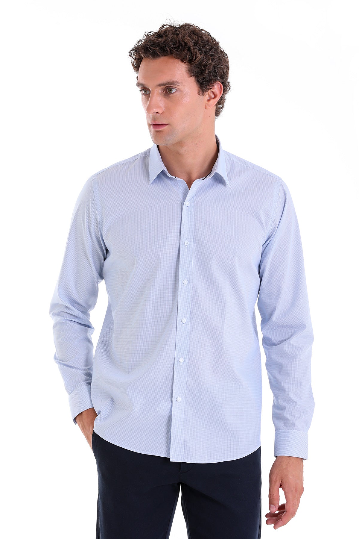Light blue, long-sleeved men’s dress shirt with a classic collar and button-down front.