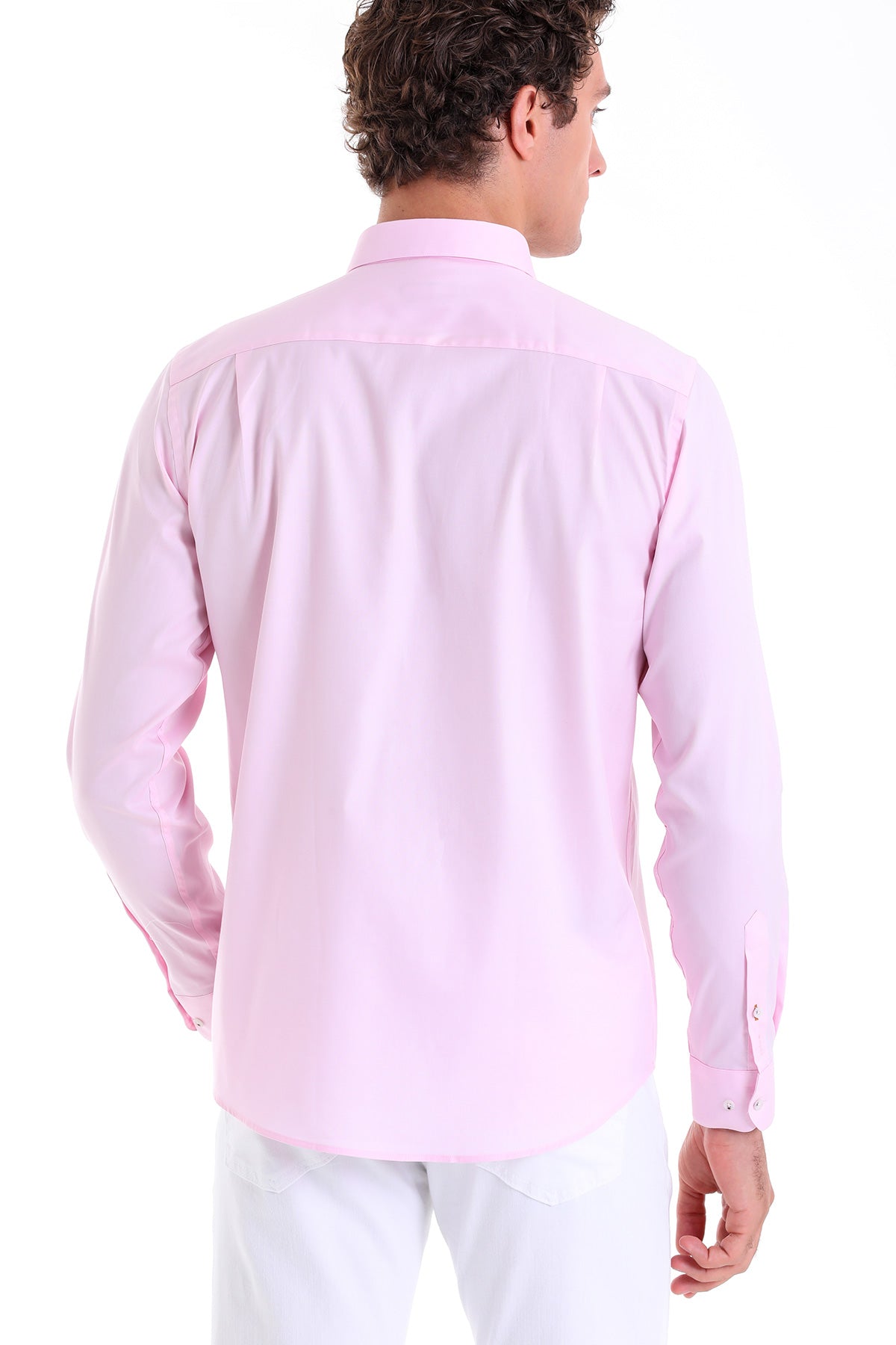 A soft pink, long-sleeved men’s dress shirt with a classic collar and buttoned cuffs.