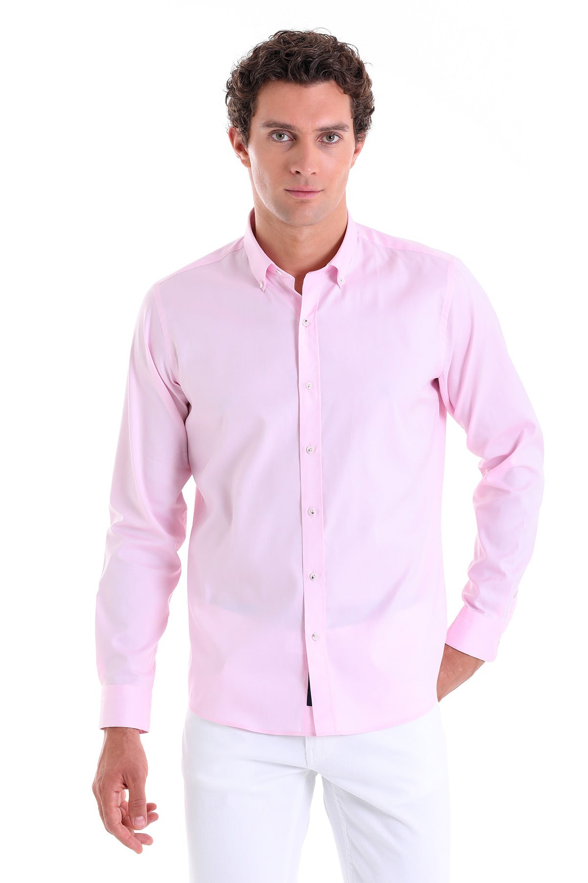 A crisp, light pink long-sleeved button-down shirt with a classic collar and neatly pressed fabric.