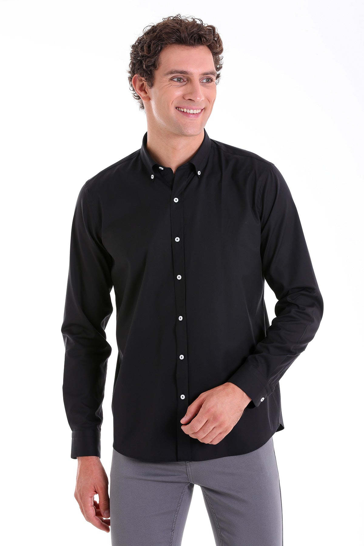 Black long-sleeved button-down shirt with white buttons and a classic collar.