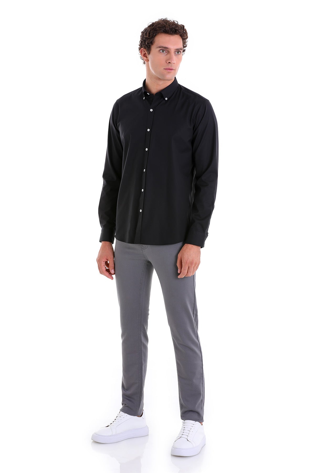 Black long-sleeved button-down shirt with a classic collar and white buttons.