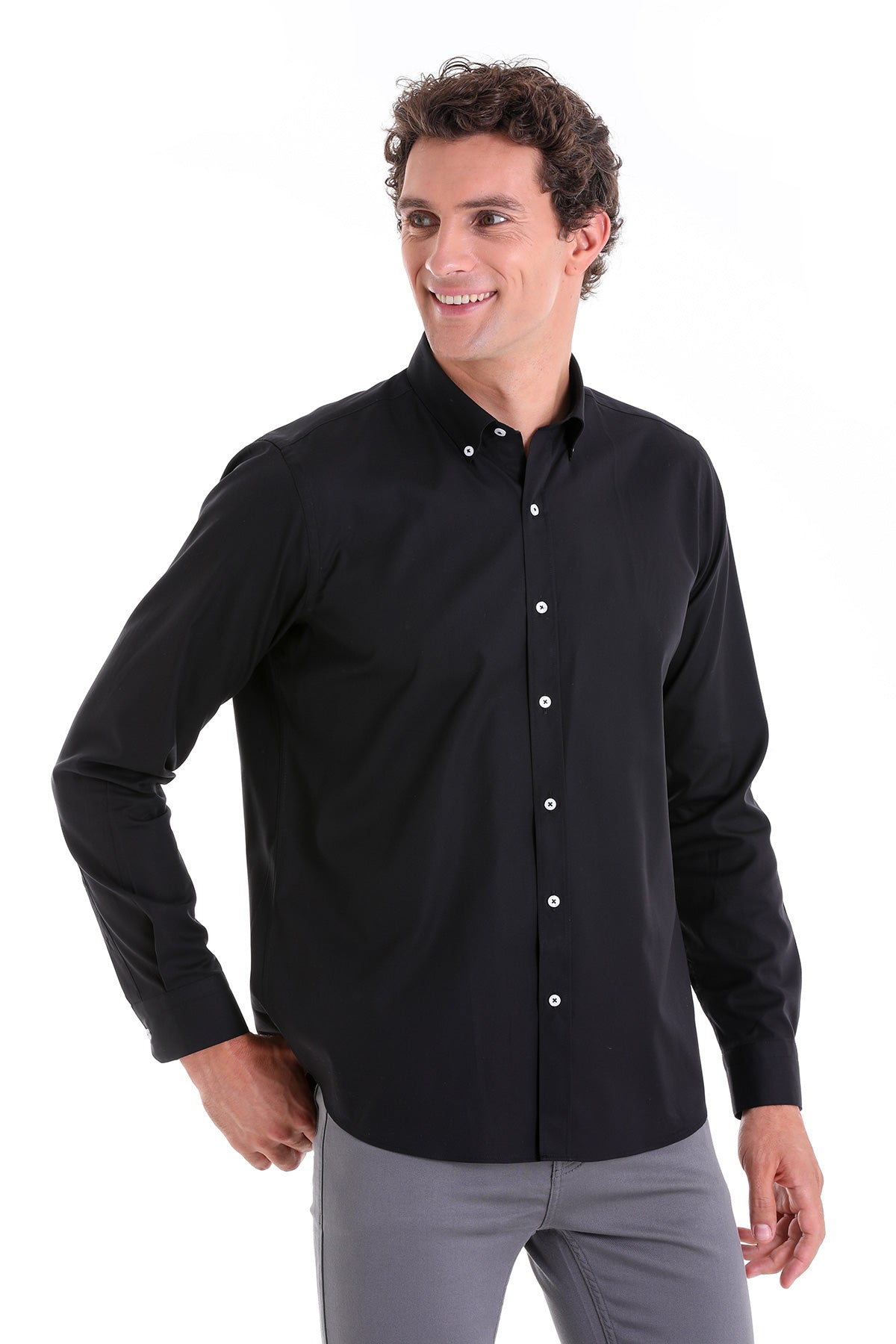 Black long-sleeved button-down shirt with white buttons.